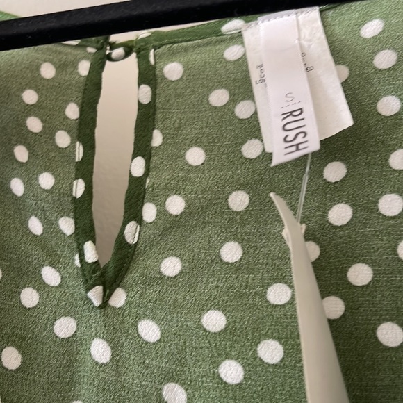 NWT Green romper with white polka dots with frilly edges on sleeve and bottom - Picture 2 of 4